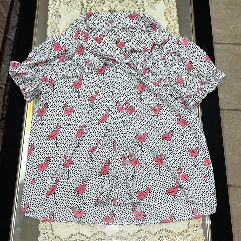 Zara black and white dotted short-sleeve blouse with pink flamingo print
